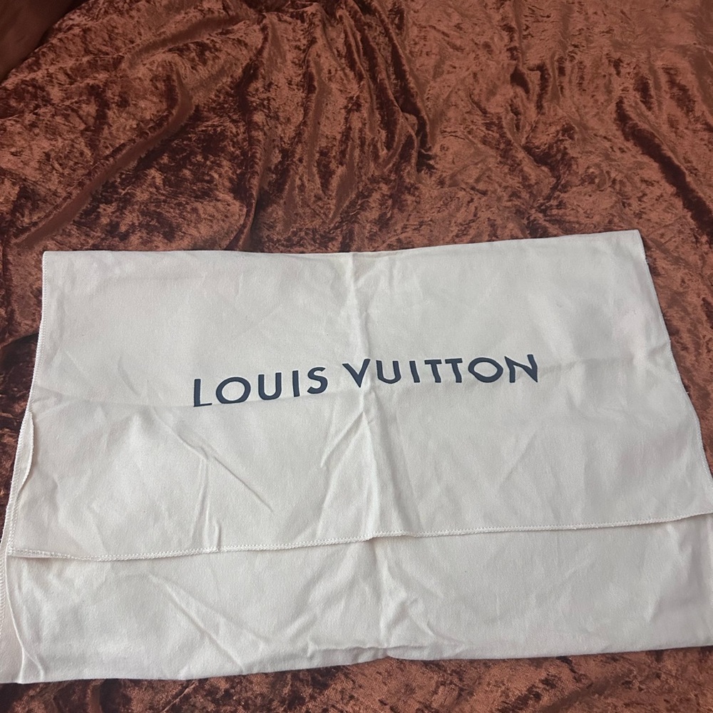 Louis Vuitton Cream duster bag
